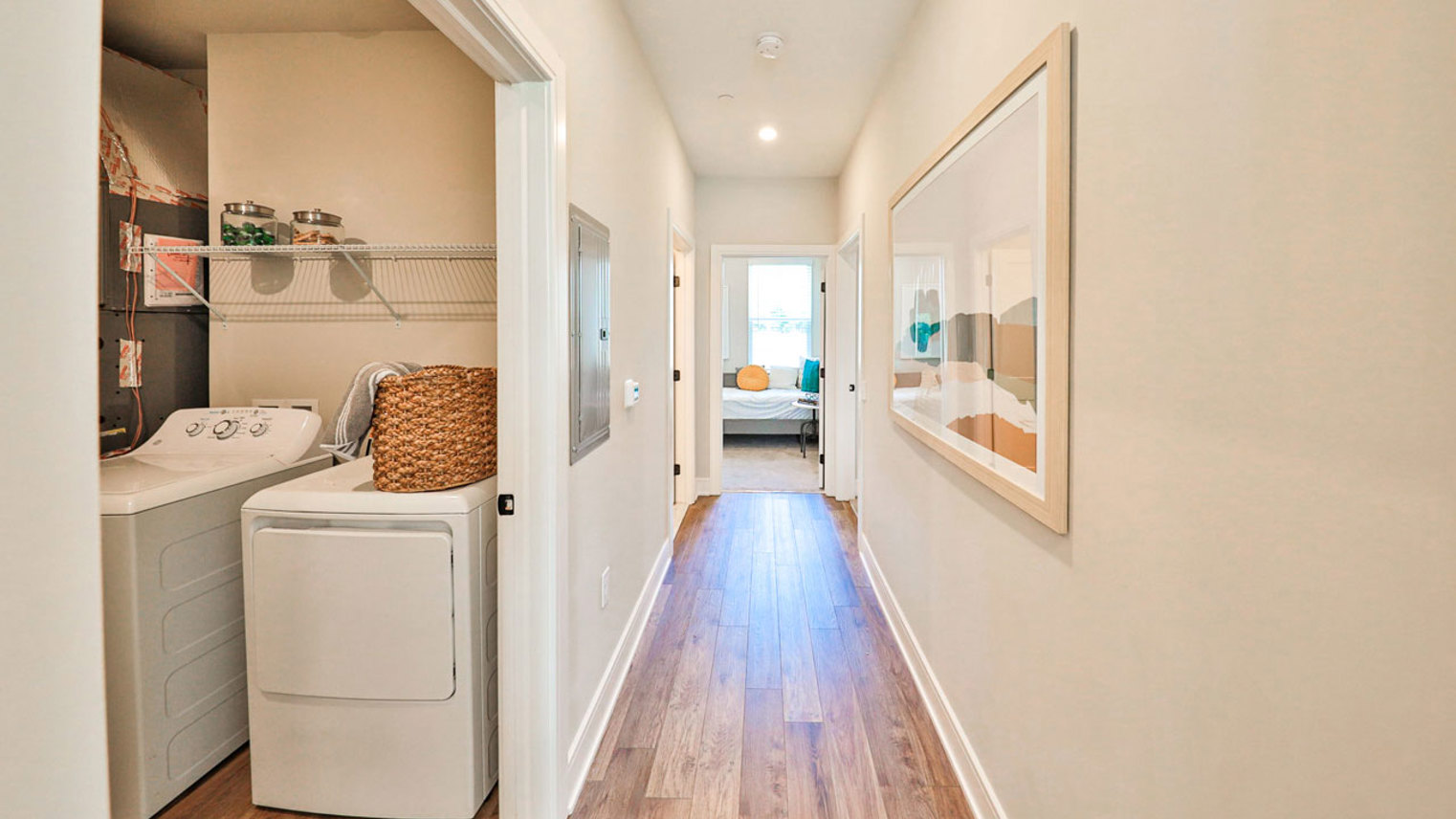 The Oaks at Copper Chase Model Hallway Laundry