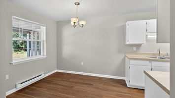 The Reserve at Copper Chase 2 Bedroom Townhome Dining Room And Kitchen