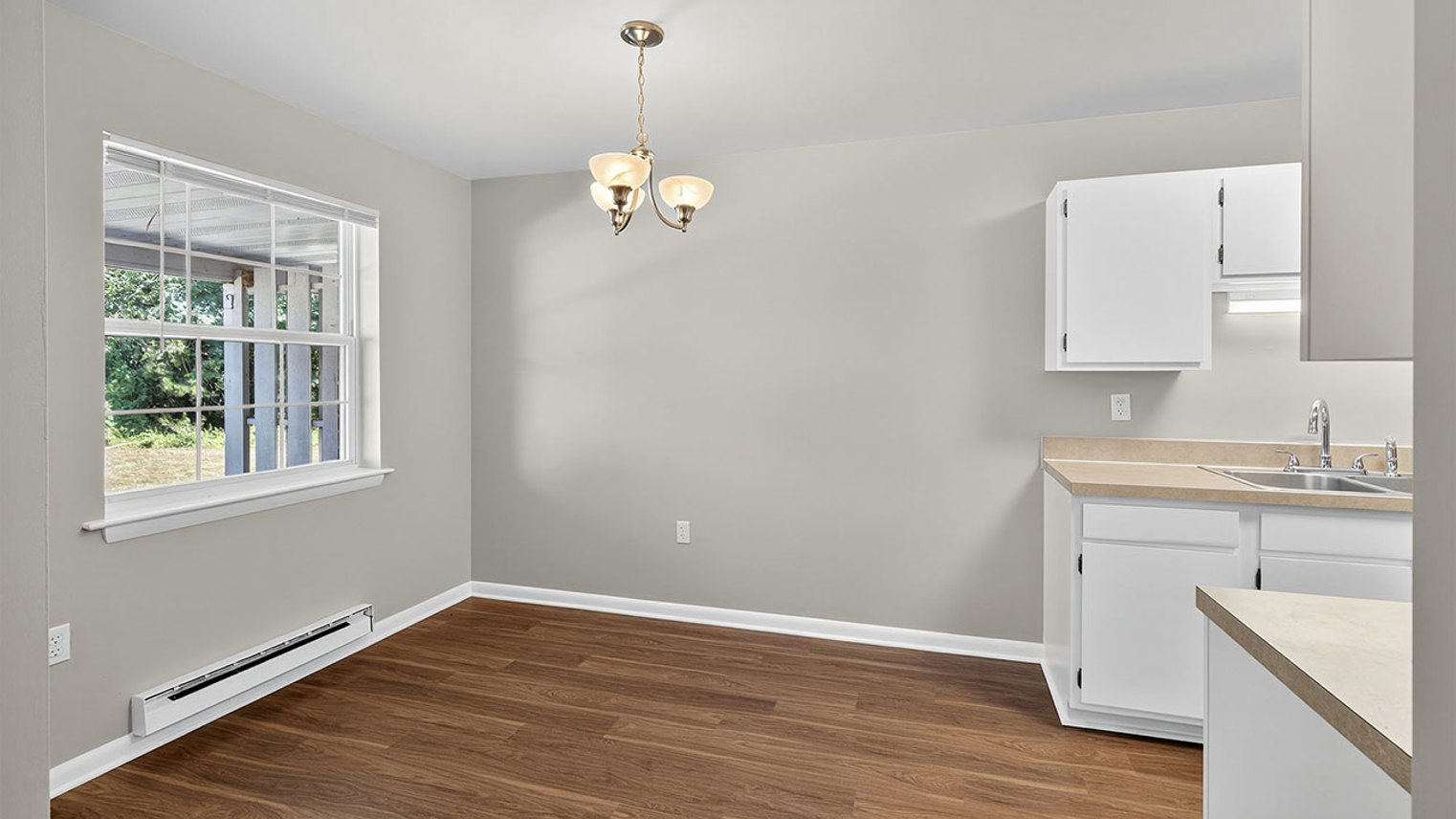 The Reserve at Copper Chase 2 Bedroom Townhome Dining Room And Kitchen